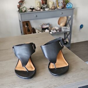 Elegant Black Women's Sandals With Stetchy Sling Around Heel Styled.